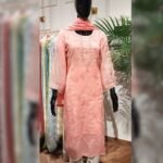 Kota fabric adorned with poth and cutdana work, the timeless art of Chikankari.