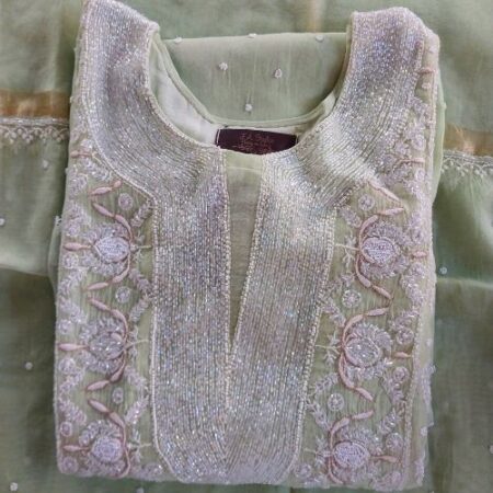 Elegance in every thread, Mul Chanderi with pearl and cutdana work.