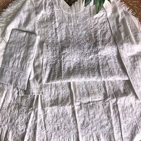 Tissue silk chikankari with elegant add-ons, where elegance meets timeless artistry.