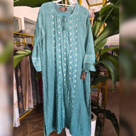 Elegance in every thread, Chikankari on Mul mul with thread work and banarasi buta.