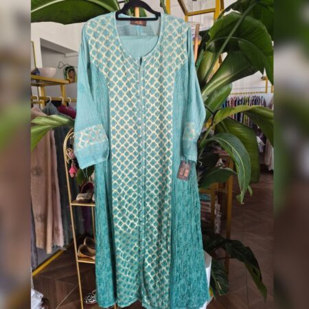 Elegance in every thread, Chikankari on Mul mul with thread work and banarasi brocade.